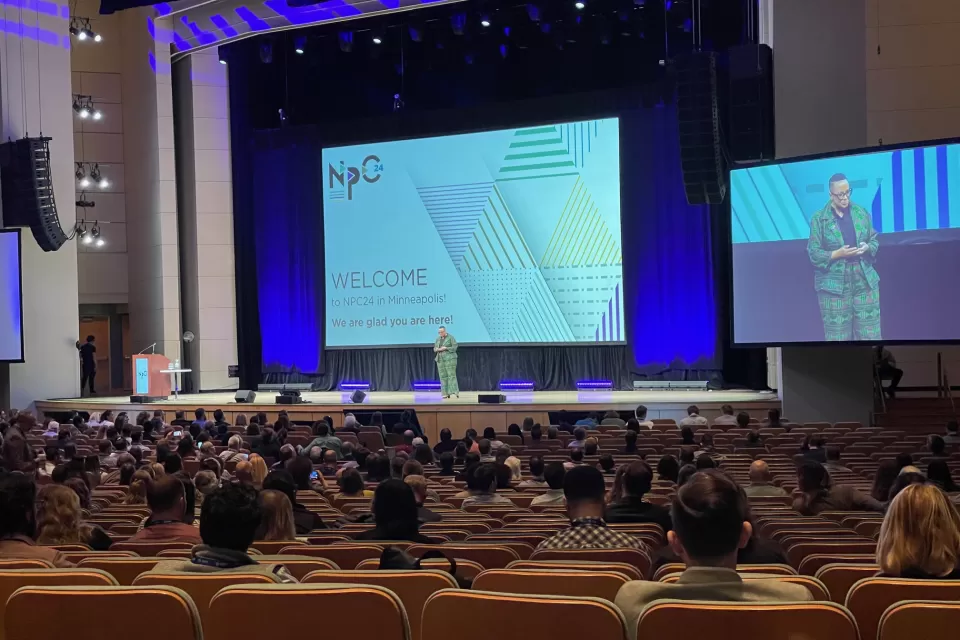View of the stage, crowd, and speaker at the opening session of NPC24.